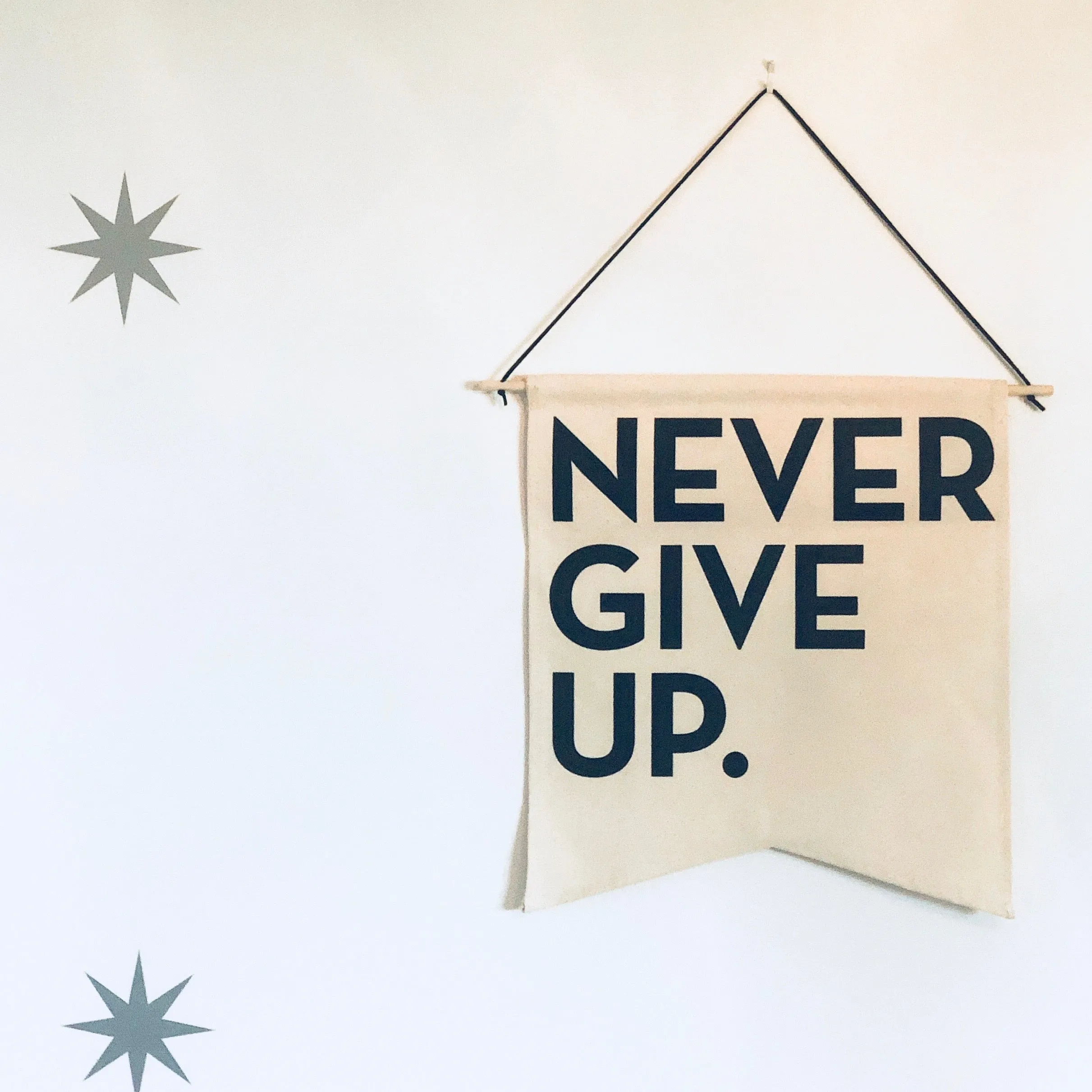 NEVER GIVE UP. CANVAS BANNER