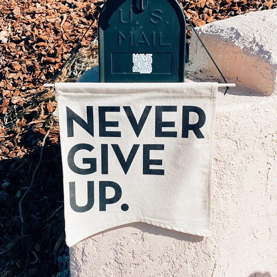 NEVER GIVE UP. CANVAS BANNER